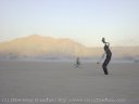 Solitary figures on the playa, Burning Man 2004